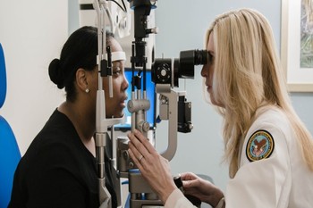 a woman gets an eye exam